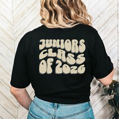 Congrats graduating Class of 2026! This is the perfect shirt to rock for your challenging years in college or high school! It will also be a great gift for your graduating loved one!  How to order: 1) Select shirt color 2) Select shirt size 3) Add to cart Shipping Time Estimated: 2-7 business days T-Shirt Specifications This classic unisex jersey short sleeve tee fits like a well-loved favorite. Soft cotton and quality print make users fall in love with it over and over again. These t-shirts hav Junior Class Shirts, Class Of 2026, Gift For Graduate, Junior Shirts, High School Graduation Gifts, Class Shirt, Spirit Shirts, Senior Year, Color 2