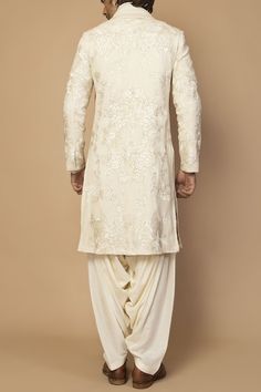 Buy Off White Matka Silk Sherwani Set For Men by Siddartha Tytler Online at Aza Fashions. Mughal Jaal, Ivory Sherwani, Embroidery Neckline, Embroidered Motifs, Dhoti Pants, Tarun Tahiliani, Embroidered Collars, Fashion App, White Silk