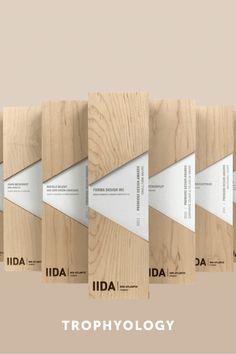 four different types of brochures on wooden boards