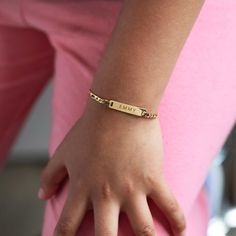 Dainty and masculine, this engravable id bracelet features a sleek bar on a Figaro chain. Perfect for layering with other bracelets or worn alone. Gold Vermeil (Thick layer of Gold plated over Sterling Silver) Plate: Width 1in(2.7cm) x Height 0.2in(0.5cm) Italian Figaro chain, width 2mm Laser Engraving Handcrafted in NYC Hypoallergenic, lead and nickel free #B193 Everyday Bracelets With Rectangular Curb Chain Links, Classic Engraved Charm Bracelet For Everyday, Classic Everyday Gold Bracelet Engraved, Rectangular Bracelet With Engraving Option For Everyday, Everyday Rectangular Bracelet With Engraving Option, Classic Name Bracelet With Curb Chain As A Gift, Classic Chain Bracelet With Personalized Nameplate, Classic Name Bracelet With Adjustable Chain, Classic Adjustable Gold Bracelet With Name Detail