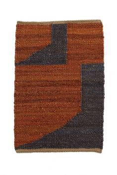 an orange and black rug on a white background