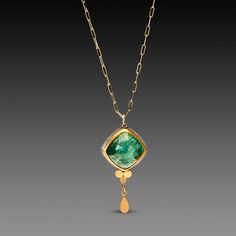 Dive into the sumptuous blue green of this deep rose cut tourmaline necklace. Rose This incredible gem is wrapped in warm 22k gold, backed with sterling silver and accented with 22k gold disks and drop. 14k gold chain. Stone measures approximately 5/8 x 5/8 inch. Matte finish. This piece is in stock and ready to ship. Gift Ornaments, Faberge Jewelry, Shiny Rings, Gemstone Necklaces, Tourmaline Necklace, Necklace Rose, Stacked Jewelry, Gemstone Necklace Pendant, Pendant Design