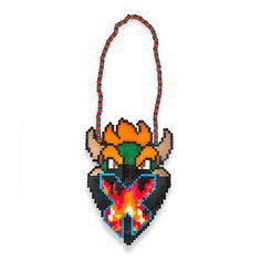 a beaded necklace with an image of a demon head on the front and back