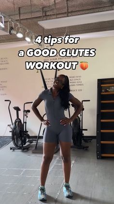 a woman standing in front of a gym machine with the words 4 tips for a good gluts workout