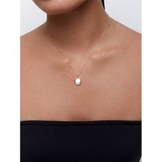 14kt Mother of Pearl Diamond Dot Coin Necklace When we think of an everyday necklace, this is it. A lustrous mother of pearl disc is set in a coin case and set with a bezeled diamond. Hangs magnificently from a 16" diamond cut chain with sparkles. This necklace is adjustable as it comes with a 2"in extension as well. Adore! 14kt Yellow Gold 2.50gm Gold 10mm Mother of Pearl 0.02ct Diamonds 16" + 2" ext Chain Lobster Lock Elegant Medallion Coin Necklace For Anniversary, Elegant Round Pendant Coin Necklace With Polished Finish, Elegant White Coin Necklace With Round Pendant, Elegant White Gold Medallion Coin Necklace, Elegant White Round Pendant Coin Necklace, Elegant 14k Gold Coin Necklace, Elegant Round Coin Necklace For Anniversary, Elegant Anniversary Coin Necklace, Elegant White Round Coin Necklace