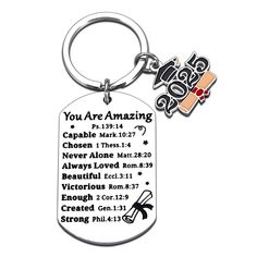 a keychain with the words you are amazing and an image of a cross on it