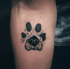 a dog's paw print on the leg