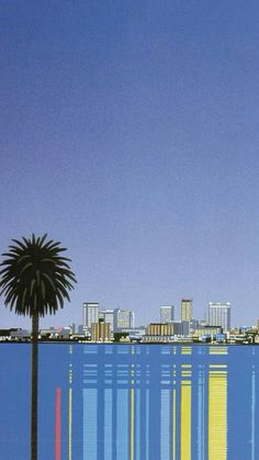 a palm tree in front of a city skyline with buildings on the other side and blue sky