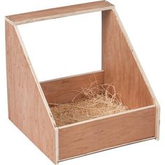 a wooden box with straw inside on a white background