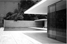 a black and white photo of an empty patio