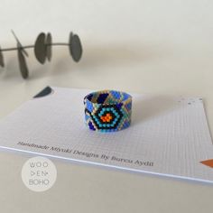 Welcome to my small business♡ Gaudi inspirational ring is made from high-quality Japenese Miyuki glass beads(not seed bead) ⚛ The width is 1.2 cm. See images to help find your ring size chart and don't forget to select your size in the dropdown menu. You can find many different designs in my shop👇 https://woodenboho.etsy.com/listing/1658237125 I am not accept returns or exchanges, this is because all my designs are made to order only for you. When you have any doubts about colors and sizes ets. Colorful Handmade Rings For Gifts, Colorful Handmade Rings As Gift, Colorful Handmade Ring Gift, Turquoise Beaded Rings As A Gift, Turquoise Beaded Rings As Gifts, Blue Beaded Rings As Gift, Blue Beaded Rings For Gifts, Blue Beaded Rings As Gifts, Blue Beaded Rings As A Gift