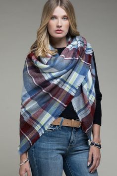 Elevate any outfit with this stylish Plaid Blanket Scarf. This cozy blanket scarf is a perfect addition to your cool-weather wardrobe and is designed with a classic plaid pattern you will love. It has a soft, warm and comfortable feel with fashionable frayed edges. It can easily be layered over many outfits for a variety of styles. Pair this piece over a sweater or denim dress or jeans for a lovely flair to your look.100% Acrylic 60" X 55" Blue And White Check Scarf, Bridesmaid Scarf, Blue Plaid Blanket, Bridesmaid Scarves, Scarf Blanket, Tartan Plaid Scarf, Woven Scarf, Winter Plaid, Tartan Scarf