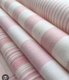 pink and white checkered fabric with stripes on the bottom, in different sizes and colors