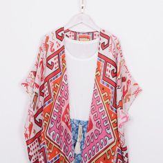 Welcome to my shop, I am in China. It will need around 30 days for international orders. Please consider the time when placing order. Long bohemian kimono,perfect for a casual day out or as a swimsuit cover up. Material: soft viscose fabric,comfortable One size fit all: Width: 35.5 inches (90cm) Side length: 46 inches (117cm) Back length:35 inches (89cm) CARE: Wash gently by hand in cold water. Single wash. Don't press! Hang to dry. Maybe you will like other items in my shop, find them here: htt