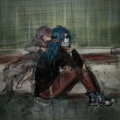 two people sitting on the ground with their arms around each other, one person has blue hair