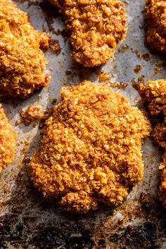 several fried food items on a baking sheet