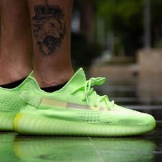 Regarded as a cultural phenomenon, the adidas Yeezy Boost 350 silhouette generated a cult following when it was initially released in 2015. This ‘Glow’ makeover—released in May 2019—equips the Primeknit upper with a high-visibility treatment and a translucent stripe to the lateral profile. Integrated lacing and a coordinating heel pull provide easy on/off. Underfoot, the signature full-length Boost midsole looks to the future with a bright glow in the dark finish. Givenchy Streetwear, Sneakers Art, Dior Sneakers, Sneakers Fashion Outfits, Street Style Shoes