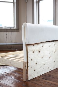 a bed frame made out of wood with the words diy ike hack bedframe to couch