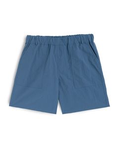 Solid blue utility shorts in ripstop nylon Blue Shorts For Spring Outdoor Activities, Blue Bottoms For Summer Hiking, Blue Shorts With Pockets For Outdoor Activities, Blue Shorts With Side Pockets For Outdoor Activities, Blue Shorts With Elastic Waistband For Outdoor, Sporty Blue Shorts For Hiking, Blue Hiking Shorts For Summer, Outdoor Blue Shorts With Elastic Waistband, Blue Outdoor Shorts With Elastic Waistband