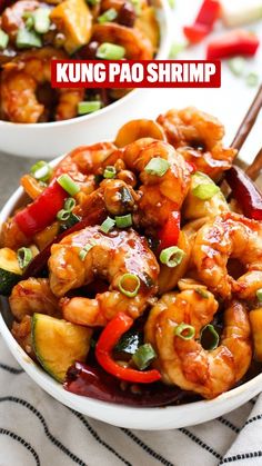 a white bowl filled with shrimp and veggies