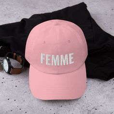 "\"Fem\" embroidered six-panel chino hat. Dad hat design in comfort color pink serves up just the right amount of femininity. * 3 ⅛\" crown * Head circumference: 20 ½\" - 21 ⅝\" \"Fem\" embroidery at front. Curved visor for that already worn-in feel. Adjustable strap with antique metal buckle provides a perfect fit. 6-Panels. 100% chino cotton twill. Hand-wash only. Designed by The Girls and Company. Made-to-order by Printful." Vintage Baseball Hats, Coffee Outfit, Hat Embroidery, Camo Colors, Dad Caps, Embroidered Hats, Dress Shirts For Women, Green Camo, Kids Hats