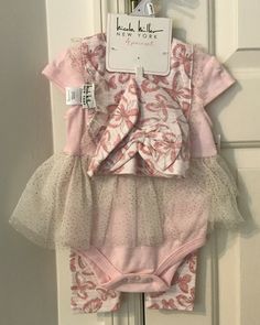 Nicole Miller New York 4 Piece Set Pink Lace Dress with Pants Bib Bonnet NWT. Still on original hanger.  MSRP $42.00 Three snap fasteners between legs on dress Elastic waist pants Bonnet with bow Bib with lace Shipping by USPS First Class Package U.S. addresses only, please. Spring Pink Two-piece Set, 3-piece Long Sleeve Sets For Spring, Casual 3-piece Set For Spring, Pink Sleeveless Two-piece Set, Fitted Matching Pant Set For Spring, Fitted Short Sleeve Pant Set For Spring, Fitted Short Sleeve Sets For Spring, Fitted Sleeveless Cotton Pant Set, Fitted Pink Cotton Set