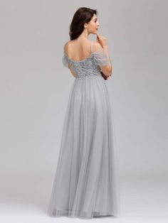 Cold Shoulder Sequin Bodice Long Tulle Bridesmaid Dress homcoming dresses, mocktail dresses, conformation dresses #dresses2021 #dressesforrent #dressesbyrusso Formal Floor-length Tulle Bridesmaid Dress, Tulle Maxi Dress For Banquets, Tulle Maxi Dress For Banquet, Summer Formal Tulle Bridesmaid Dress, Floor-length Tulle Bridesmaid Gown, Floor-length Tulle Gown For Bridesmaids, Tulle Maxi Dress With Sweetheart Neckline For Bridesmaid, Bridesmaid Tulle Evening Dress For Prom Season, Tulle Maxi Dress For Bridesmaids