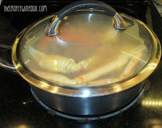 a pan with some food inside of it on top of a stove burner oven