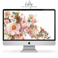 an apple computer with flowers on the screen