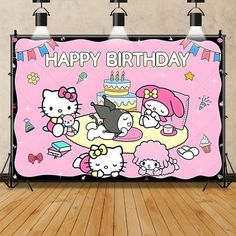 an image of a birthday party with hello kitty on the table and other cartoon characters