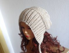 "Slouchy Ear Flap Hat Women slouchy hat Knitted slouchy beanie full handwork made on wires, from soft yarn Cleaning: hand-wash in cool water and lay flat to dry. It was made in a smoke free environment. Available in sizes: S - 19.5 - 21.3 inches (50 - 54 cm) M - 20.5 - 22.4 inches (53 - 57 cm L - 21.5 - 23.2 inches (55 - 59 cm) XL - 22.8 - 24.5 inches (58 - 63 cm) You can also specify the circumference of the head. Then the cap is the best fit :-)) You can choose any color. In the colors selecti Adjustable Beige Cozy Beanie, Adjustable Cozy Beige Beanie, Cozy Beige Crochet Beanie Hat, Adjustable Cozy Beige Hat, Cozy Beige Crochet Hat, Cozy Adjustable Beige Hat, Cozy Warm Beige Crochet Hat, Cream Bohemian Winter Hat, Bohemian Beige Crochet Hat For Winter