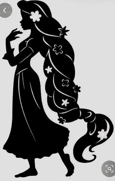 the silhouette of a woman with long hair and flowers on her head is shown in black