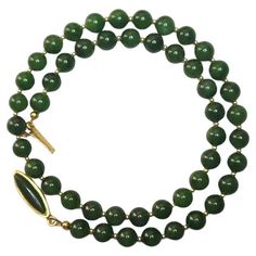 This beautiful, elegant, timeless necklace is made of high-quality natural Russian Siberian nephrite. The nephrite beads are top quality, uniform deep green, and they're sumptuous in how they look and feel. Authentic, natural color. No thermal or other mechanical treatments were used. This necklace alternates beads of nephrite with 2 mm 14K gold beads. The necklace fastens with a vintage gold plate clasp with natural jade cabochon. The length of the necklace is 19.5 inches (49.5 cm). The size of the smooth round nephrite beads is 8 mm. The weight of the necklace is 44 grams. This necklace is for those who appreciate and love classics. It is necklace absolutely charming. "You have to see it to believe it." Much more charming in reality! This is the perfect gift for yourself or someone speci Russian Jewelry, Dark Autumn, Vintage Beads Necklace, Nephrite Jade, Autumn Clothes, Jade Necklace, Natural Jade, Deep Green, Gold Beads