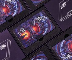 six coasters with different designs on them sitting next to each other in black boxes