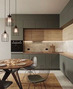 a kitchen with a table and chairs in it