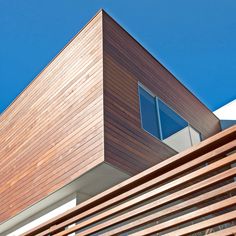 the side of a house with wooden slats