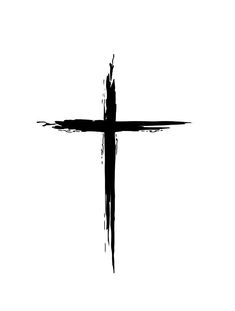 a black and white photo of a cross with paint splattered on it's side