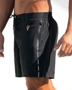 Elevate your summer style with the epitome of modern sophistication – Tucann’s Black Swim Shorts. If you're seeking the ultimate swim short to complete your collection, look no further! These men’s swim shorts boast a contemporary and sleek design that is effortlessly wearable, while the impeccable fit guarantees comfort all day long. Look closely, and you'll notice the gold-shaped Tucann aglet on the drawstring and rubber logo, adding a touch of refinement and style to these iconic black men's Black Swim Shorts, Black Swim Trunks, Swim Short, Mens Swim Shorts, Man Swimming, Mens Swimwear, Swim Trunks, Swim Shorts, Summer Style