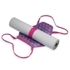 the yoga mat is rolled up and ready to be used as a pillow or cushion