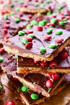 chocolate barkle with candy and sprinkles on a cutting board, ready to be eaten