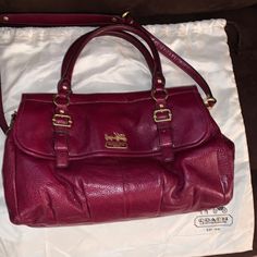 Coach Bag Authentic Never Used, Beautiful Red With Silver Silky Lining. Comes With Huge Dust Bag And Original Box With Straps So It Can Be Worn As A Cross Body Bag. The Bag Itself Is Big See Pics For Measurements. The Bag Can Fit Almost Anything And As Women We Love A Big Bag We Can Put Our Essentials In. Designer Burgundy Satchel With Top Handle, Designer Burgundy Top Handle Satchel, Designer Burgundy Satchel With Detachable Handle, Designer Burgundy Satchel For Everyday Use, Designer Burgundy Bag With Handles, Burgundy Satchel With Gold-tone Hardware, Designer Burgundy Bag With Top Carry Handle, Designer Burgundy Bags With Top Carry Handle, Designer Burgundy Shoulder Bag With Double Handle