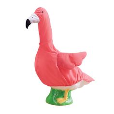 an inflatable pink flamingo sitting on top of a green base