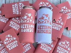 several red and white stickers with the words getting hitch on them are scattered around a can