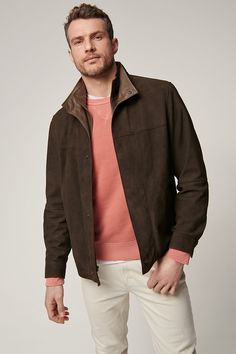 The Andrew suede jacket gives everything you wear a touch of sophistication. Andrew's modern appeal is accentuated by its architectural double collar, subtle contrast leather details, and a clean front placket with a hidden snap and zip closure. But this jacket isn't just good looking, it also functions; with a total of five pockets in which to stow all your valuables. Modern Leather Jacket For Business Casual, Luxury Fall Outerwear With Fold Down Collar, Modern Leather Outerwear With Long Sleeves, Modern Leather Long Sleeve Outerwear, Luxury Leather Outerwear For Business Casual, Leather Outerwear With Padded Lapel Collar, Spring Leather Outerwear For Business Casual, Leather Outerwear With Concealed Placket For Business Casual, Brown Leather Jacket With Suede Lining For Work