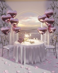 the table is set up for a wedding reception with pink petals on the table and chairs