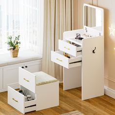 a white vanity with two drawers and a mirror on the wall next to a window