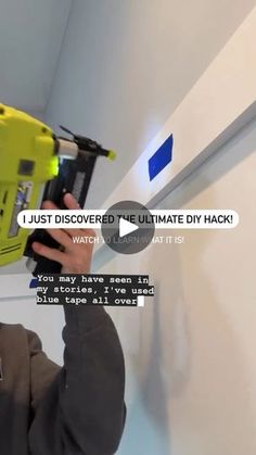 a man holding a yellow and black device in his hand with the words, i just discovered the ultimate diy hack