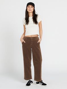 The 1991 Stoned Low Rise corduroy pants are the perfect low rise wide leg fit pants that are as on trend as they are timeless. Made of 98% Cotton / 2% Elastane, 11 Wale Stretch Corduroy, they provide a comfortable stretch for all-day wear. Embrace the retro vibes. -   - 30" inseam  - 98% Cotton / 2% Elastane, 11 Wale Stretch Corduroy  - Low rise wide leg pant  - Zipper fly with foldover waistband  - Volcom signature denim branding  - 10" front rise Chinos Women Outfit, Low Rise Pants, Denim Branding, Corduroy Pants, Chinos Pants, Low Rise, Workout Pants, Cute Casual Outfits, Wide Leg Pants