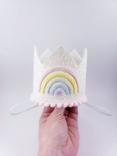 "Are you celebrating a rainbow themed birthday? Then this mini crown is for you! Adorable kids need adorable party accessories, especially for celebrating birthdays! \"sweetcakes and sassypants\" is your one-stop shop for all of your birthday crown needs! Sure to dress up any picture or just to wear for adorable fun, your little one will love wearing these beautiful, hand-crafted party crown accessories. Each purchase also comes with a free matching gift as my way of saying THANK YOU! This listi Cute Birthday Crown With Round Shape, Whimsical Tall Crown For Birthday, Cute Multicolor Birthday Party Supplies, Pastel Rainbow Party, Pastel Rainbow Birthday, Woodland Fairy Birthday, 1st Birthday Crown, Crown Accessories, Mini Crown