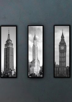 three black and white pictures hanging on a wall with the city skyline in the background